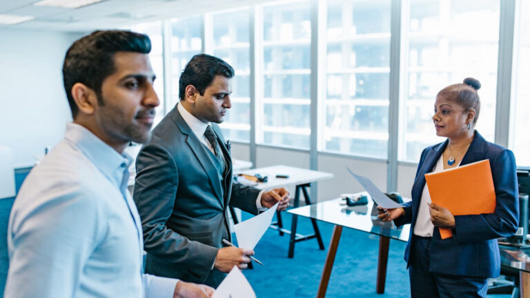 Team of professionals in a collaborative discussion