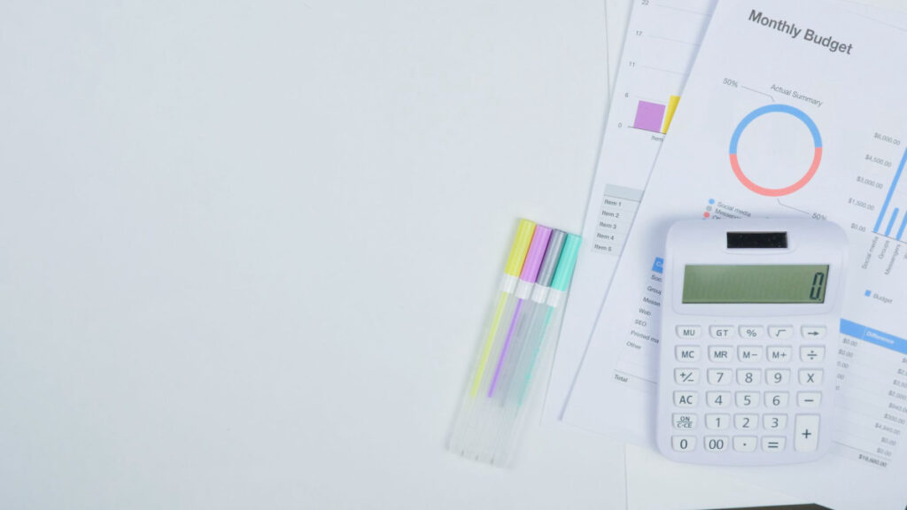 Budget planning with calculator and documents