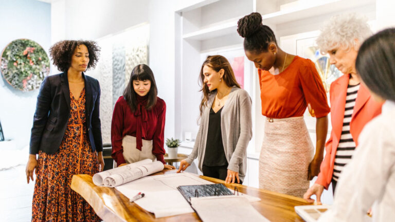 Diverse team collaborating in a modern workplace environment