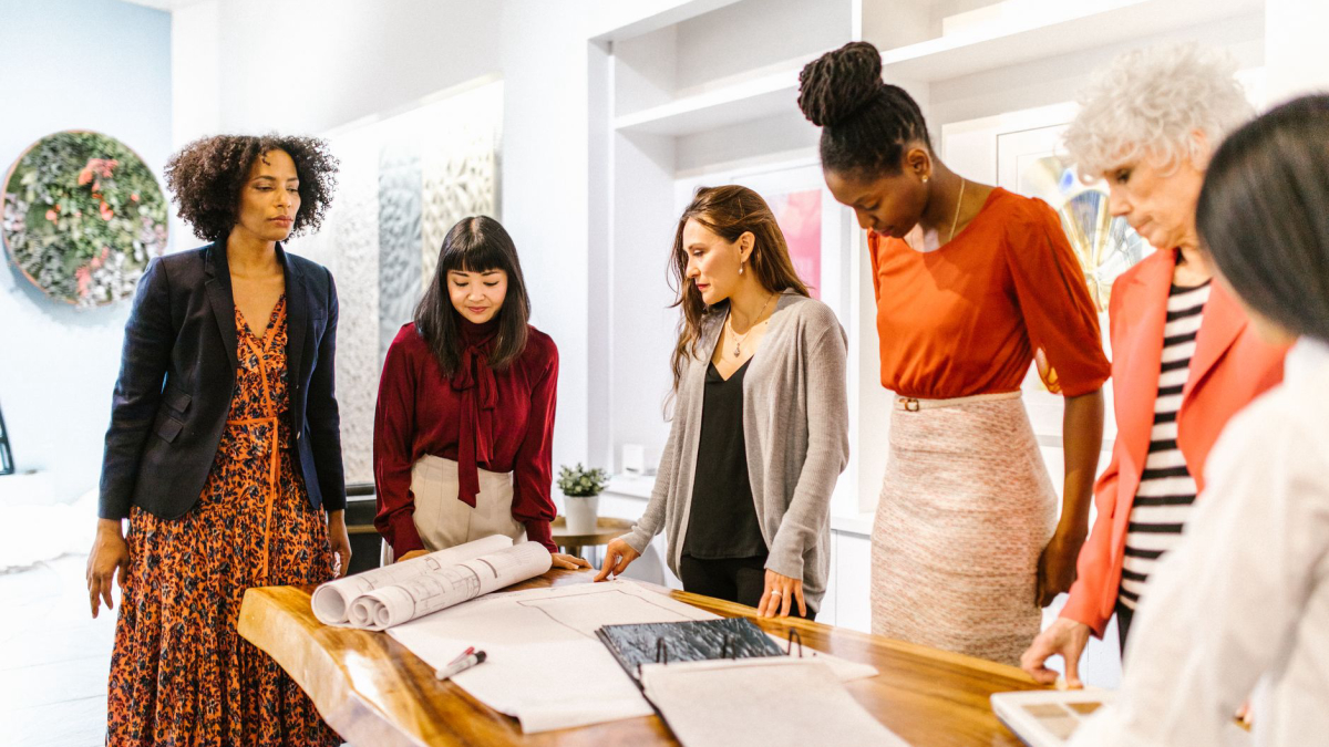 Diverse team collaborating in a modern workplace environment