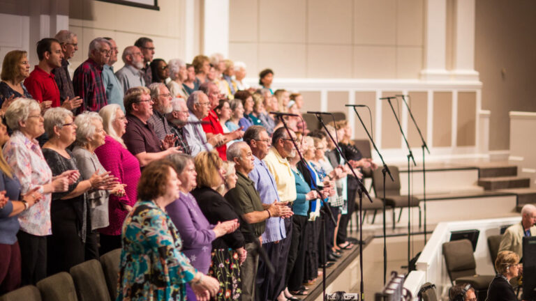 Group of people enjoying music together in an inclusive community setting